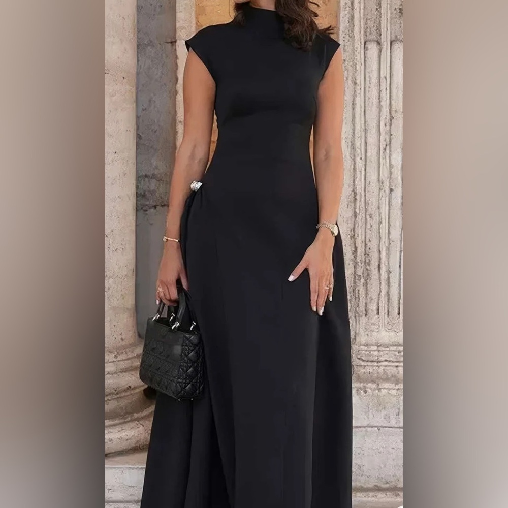 Chic Black Halter Midi Sheath Dress with Metallic Adornment